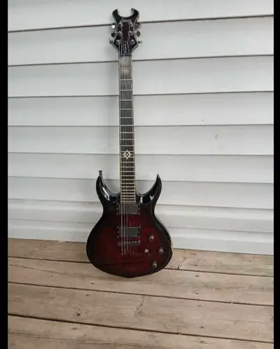 Schecter Devil Custom electric guitar. This guitar has certainly seen some things. Has some wear, so...