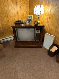Vintage TV in wooden cabinet