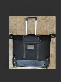 suitcase with wheels (53x57X27cm)
