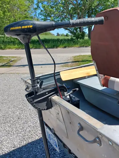 Good condition 12 foot long aluminum boat with 3 seats, rubber floor mats and tie down straps. Trail...