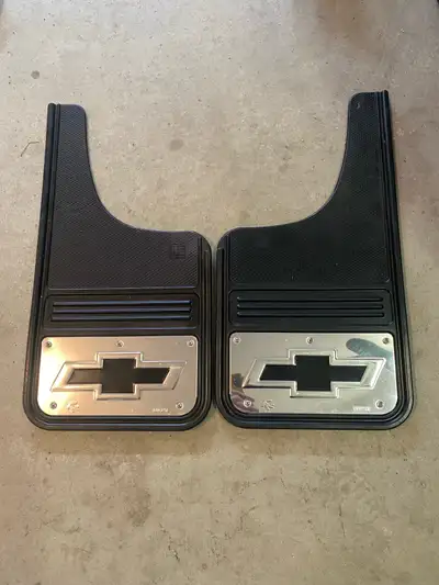 New never used. Stainless steel plate mud flaps for pick ups, front or back