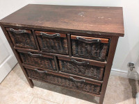 Wooden cabinet with basket drawers