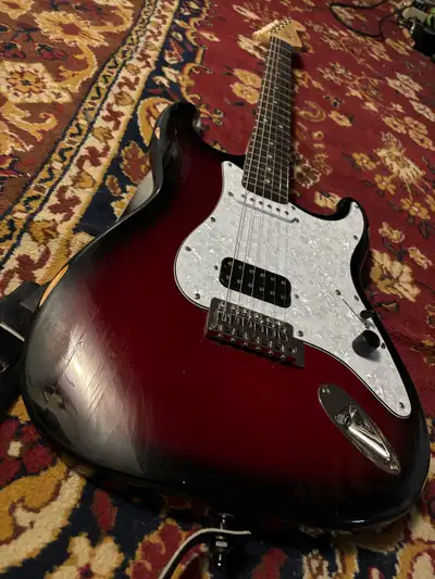 Custom relic’d Stratocaster! Humbucker is from a HH telecaster, and the neck pickup is from a squier...