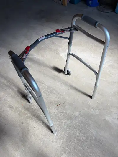This lightweight, adjustable mobility walker features two front wheels for smooth maneuverability an...