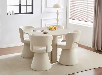 Round Pedestal Dining Table | Cream Boucle Swivel Chairs, View more