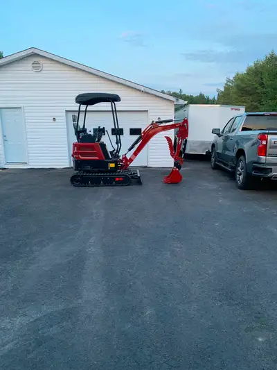 2ton challenger with 3cylinder Kubota diesel engine. Has ripper, 8” auger,16” clean up bucket, a two...