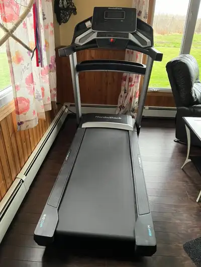 This NordicTrack EXP 7i treadmill, originally purchased in 2021, is in excellent shape and has been...