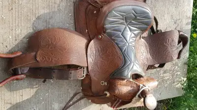 I have beautiful western pleasure saddle for sale. In very good condition. Info in pics. Make me an...