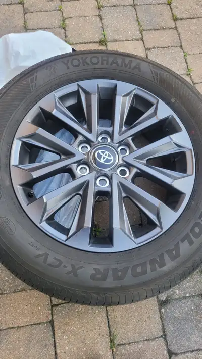 Selling a brand new complete set of 4 OEM Toyota/Lexus wheels with Yokohama Geolandar X-CV tires mou...