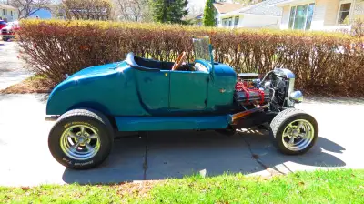 27 model T Roadster. 327, turbo 350 w/ hi stall convertor,TCI shifter, lumpy cam edelbrock 600 & per...