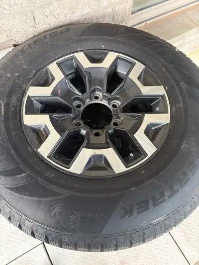2023 Toyota Tacoma 245/75/16 winter tires and rim Certified Wintertrek with 11/32 tread and center c...
