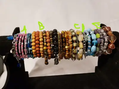 First picture: A - memory wire bracelets B- Wooden elastic bracelets C- real stones red/orange stone...