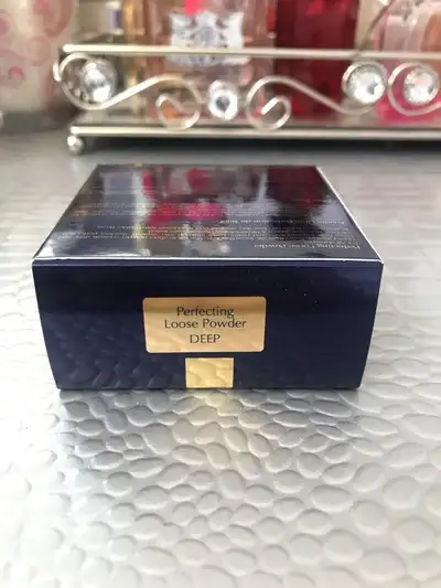 Brand new and never opened Estee Lauder perfecting loose powder in Deep. Regular retail price $52. P...