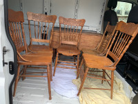 Antique table and press back chairs