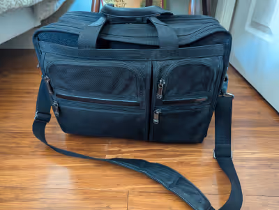 TUMI Alpha series Executive Expandable Laptop Brief Case. This is a premium brief case made of durab...