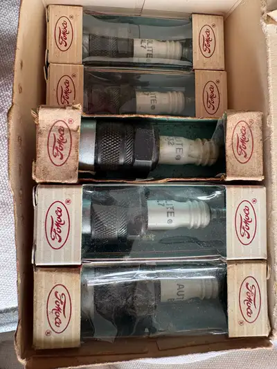 Autolite brand from original FoMoCo with packaging and Autolite packaging after Ford sold their bran...