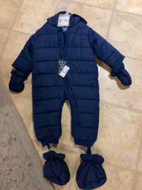 Brand new 12-18m one-piece snowsuit with matching gloves/booties