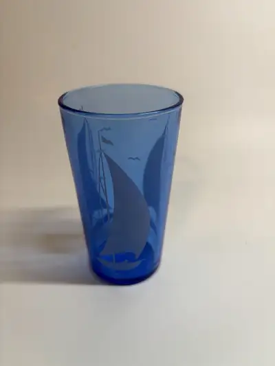 Depression Era Cobalt Blue sailboat glass. It is 4 inches in height by 2 inches. In new condition. W...