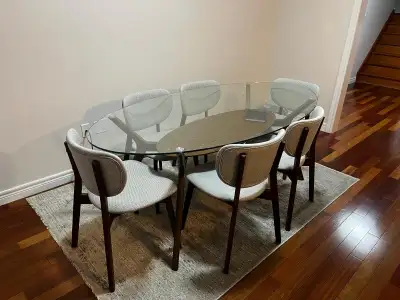 Selling our Structube Odense Dining Table with glass top and 6 matching chairs in excellent like-new...
