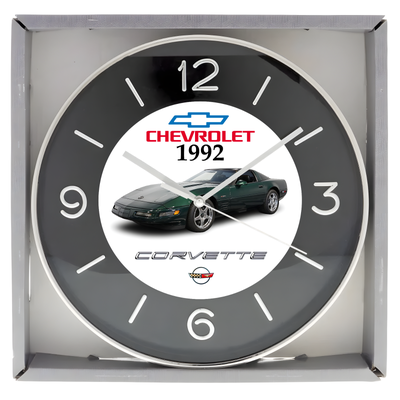 Brand new boxed wall clock approximately 10 inches in diameter featuring Custom designed artwork. Cl...
