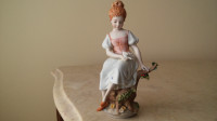 Nice antique Italian Capodimonte woman porcelain figurine.