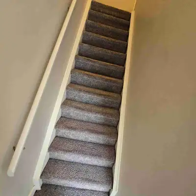 I am offering a room for rent. This room is located in a house with carpeted stairs, offering a quie...
