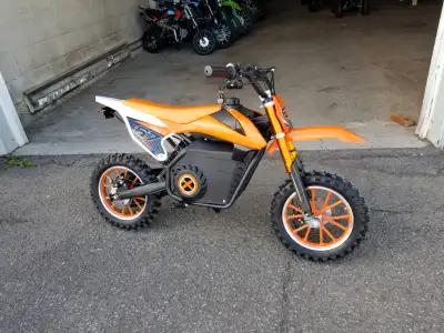 MOTOCROSS ÉLECTRIQUE NEUF 1000W , ORANGE( vrai motocross) roue 15'' 649D ROUTE 289 SAINT-ALEXANDRE D...