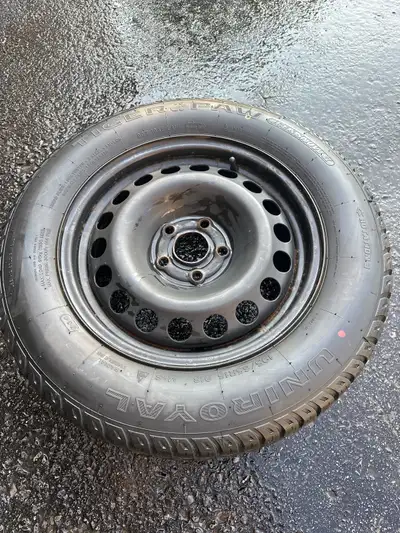 4 Barely used winter tires and rims off a chevy sonic LT. 195/65R15.