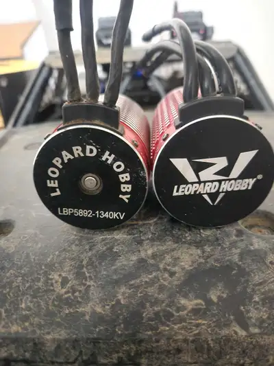 For sale are a pair of Leopard Hobby RC car motors, known for their robust performance and reliabili...