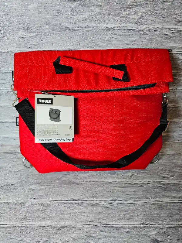 Thule Sleek Changing Bag (Energy Red) in Strollers, Carriers & Car Seats in Kitchener / Waterloo - Image 2