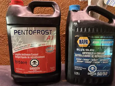 Red antifreeze mostly full blue antifreeze about half full