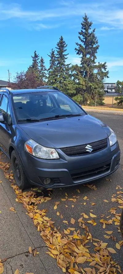I'm selling my used Suzuki SX4, a reliable and compact vehicle perfect for city driving and weekend...