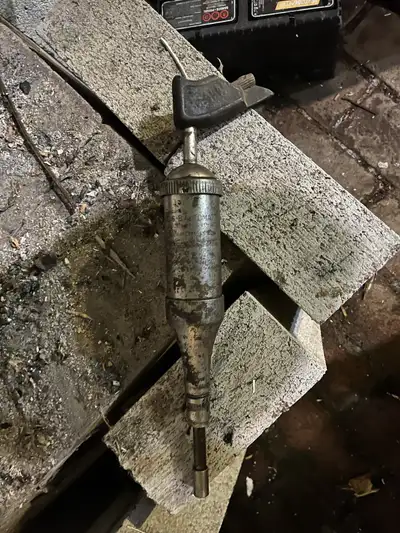 Antique No. 6 B Automatic Grease Gun.
