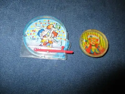 Very rare little plastic toy games made in Hong Kong. 1 is a neat little pinball game appx. 2" x 2"....