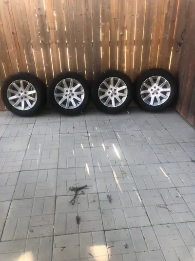 235/60r18 snow tires on Ford alloy wheels 5x114.3 bolt pattern From 2011 Ford Flex One tire recently...