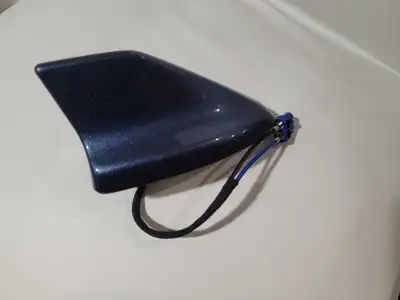 Brand new Ford roof shark fin antenna. Model number JD9T-19K351-AA Chrome Blue, paint code 5JCT Ford...