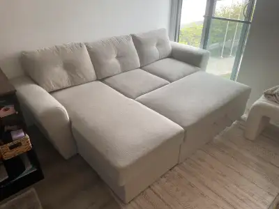 Great Condition JYSK « VEJLBY » Beige Sofa with Storage and Bed. No tears. Non-smoking and no kids....