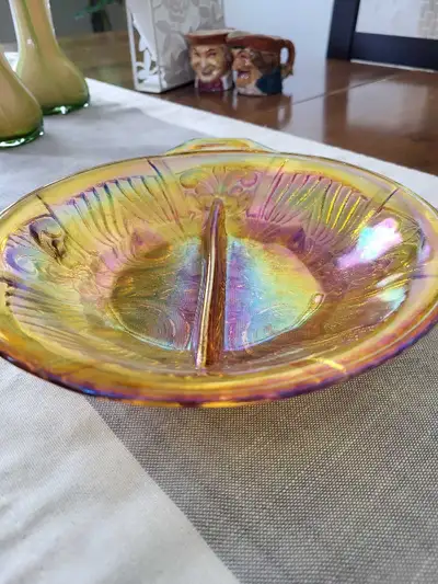 2 vintage pieces of glassware, one is amber glass. Candy dish and smaller flat dish as shown. No chi...