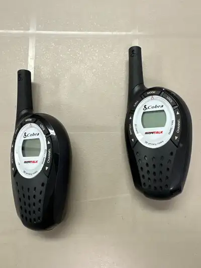 Cobra 22 Channel FRS walkie talkies. Both radios work and are in excellent condition. Each radio use...