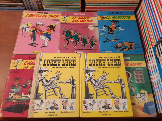 Lucky Luke Bandes dessinées BD Lot de 17 bd abîmées 2$ et + dans Bandes dessinées  à Laurentides - Image 2
