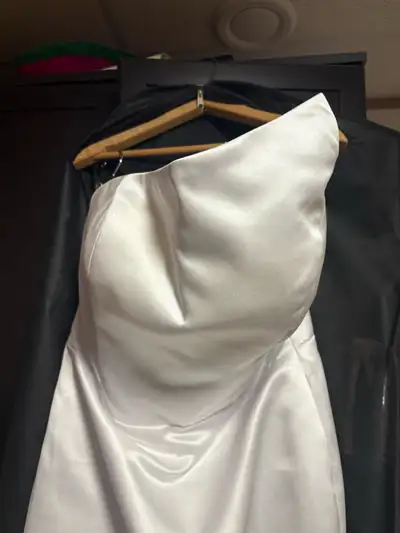 Worn for 45 mins. Good condition. New. Size 10 but fits small or bigger they back has corset so can...