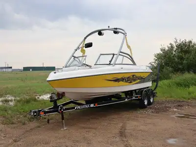 LOW HOURS. Great Condition. Trailer included. Offering the best combination of size, comfort and per...