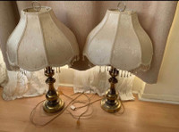Pair of Brass lamps with light bulbs. 31 inches high.