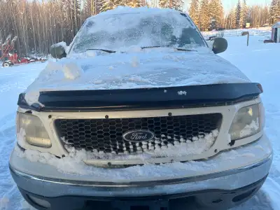 2000 ford f150 extended cab for parts or fixer up. Good tires, fairly clean interior, engine was run...