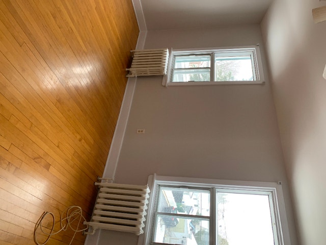 Clean centrally located upstairs 2 bedroom apt for rent, June 1 Long