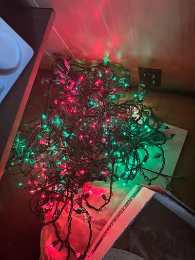 Spruce up your holiday decor with this lot of red and green Christmas lights! These festive lights a...