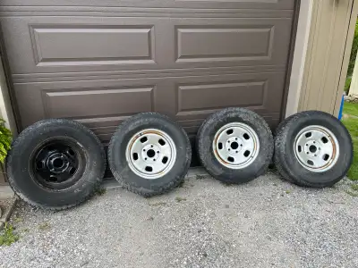 Ram 1500 steel rims and tires. Tire life is done but the steel rims still got some life left. No pre...