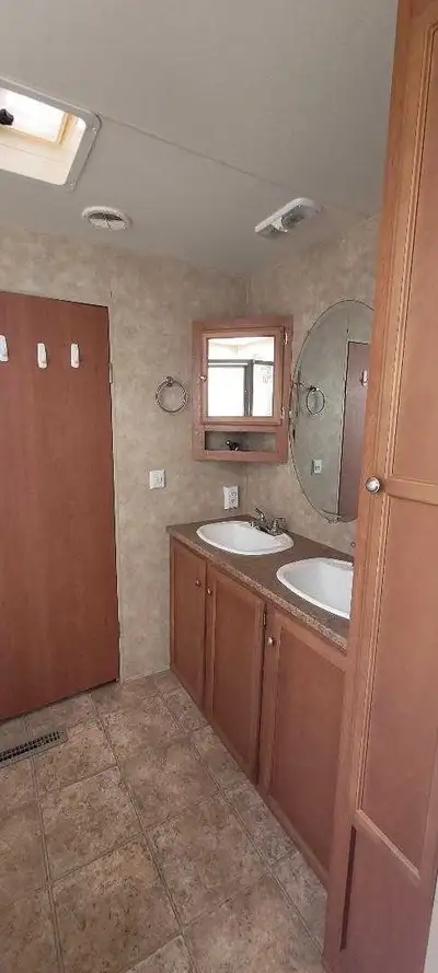 Travel trailer sportsman in great condition 36ft Two bedroom His and Her Sync King size bed Four bun...