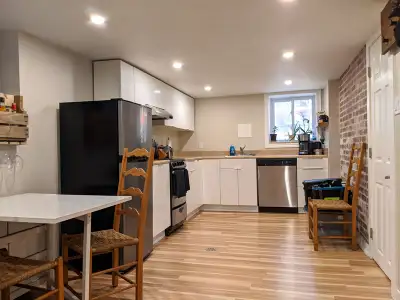 Bright modern 2 bed + den basement apt near Bathurst & St. Clair