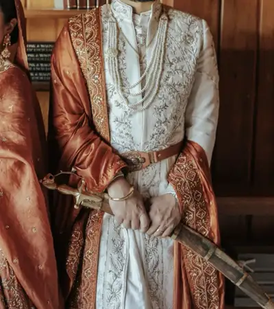 Designer rust theme groom sherwani / achkan, View more
